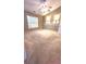 Large bedroom with neutral carpeting and ceiling fan at 106 Hardee Ave, Summerville, SC 29485