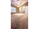 Large bedroom with neutral carpeting and ceiling fan at 106 Hardee Ave, Summerville, SC 29485
