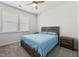 Well-lit bedroom with ceiling fan and gray carpeting at 706 Squire Pope Rd, Summerville, SC 29486