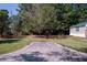 Landscaped yard with spacious driveway and mature trees at 170 Renau Blvd, Summerville, SC 29483