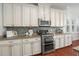 Modern kitchen with stainless steel appliances and granite countertops at 1174 Ayers Plantation Way, Mount Pleasant, SC 29466