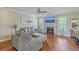Cozy living room with hardwood floors, fireplace and comfy sectional sofa at 620 Chigwell Springs Ln, Summerville, SC 29486