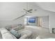 Spacious bonus room with vaulted ceiling, comfortable seating, and large TV at 620 Chigwell Springs Ln, Summerville, SC 29486