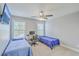 Cozy bedroom with twin beds, desk, and plenty of natural light at 620 Chigwell Springs Ln, Summerville, SC 29486