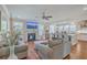 Open concept living space with a fireplace and kitchen access at 620 Chigwell Springs Ln, Summerville, SC 29486