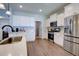 Clean kitchen featuring white shaker cabinets and stainless steel appliances at 1746 Pierpont Ave, Charleston, SC 29414