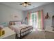 Spacious bedroom with a metal bed frame and plenty of natural light at 1746 Pierpont Ave, Charleston, SC 29414