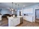 Open concept kitchen with island and stainless steel appliances at 1746 Pierpont Ave, Charleston, SC 29414