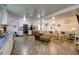 Open living room and kitchen with hardwood floors and comfortable seating at 1746 Pierpont Ave, Charleston, SC 29414