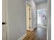 Bright hallway with hardwood floors and access to bedrooms at 1746 Pierpont Ave, Charleston, SC 29414
