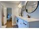 Double vanity bathroom with a view into a bedroom at 1746 Pierpont Ave, Charleston, SC 29414
