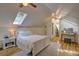 Bright bedroom with white bed frame and skylights at 1746 Pierpont Ave, Charleston, SC 29414