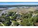 Aerial view of neighborhood with marsh and water views at 3906 Heron Marsh Cir, Johns Island, SC 29455