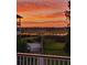 Stunning sunset view over marsh from private deck at 3906 Heron Marsh Cir, Johns Island, SC 29455