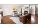 Bright living room with hardwood floors and a cozy seating area at 3906 Heron Marsh Cir, Johns Island, SC 29455