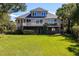 House exterior with large backyard and lush green lawn at 3906 Heron Marsh Cir, Johns Island, SC 29455