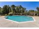 Community pool with lounge chairs and a pergola at 3906 Heron Marsh Cir, Johns Island, SC 29455