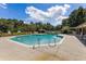 Community pool with lounge chairs and a pergola at 3906 Heron Marsh Cir, Johns Island, SC 29455