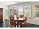Breakfast nook with wood table and chairs, offering water views at 3906 Heron Marsh Cir, Johns Island, SC 29455
