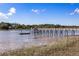 Private wooden dock perfect for fishing and boating at 3906 Heron Marsh Cir, Johns Island, SC 29455