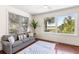 Sitting area with sofa and large windows overlooking water views at 3906 Heron Marsh Cir, Johns Island, SC 29455