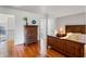 Bedroom with wooden bed frame and dresser, hardwood floors at 3906 Heron Marsh Cir, Johns Island, SC 29455