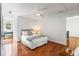 Bedroom with hardwood floors and access to a hallway at 3906 Heron Marsh Cir, Johns Island, SC 29455