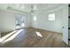 Bright bedroom with hardwood floors and French doors leading to a deck at 1467 Jeremy Cay Ct, Awendaw, SC 29429
