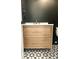 Modern bathroom with light wood vanity, black walls and geometric floor tiles at 1467 Jeremy Cay Ct, Awendaw, SC 29429