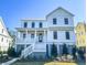 Two-story home with white siding and gray accents at 1467 Jeremy Cay Ct, Awendaw, SC 29429