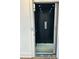 Private home elevator with wood-look flooring and dark interior at 1467 Jeremy Cay Ct, Awendaw, SC 29429
