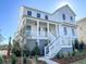 Two-story home with white siding and gray accents at 1467 Jeremy Cay Ct, Awendaw, SC 29429