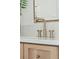 Modern bathroom vanity with sleek gold fixtures and marble countertop at 1480 Jeremy Cay Ct, Awendaw, SC 29429