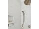 Spa-like shower with marble tile and gold fixtures at 1480 Jeremy Cay Ct, Awendaw, SC 29429