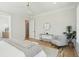Main bedroom with sitting area and access to en-suite bathroom at 1480 Jeremy Cay Ct, Awendaw, SC 29429