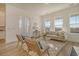 Light-filled living room with neutral decor and ample natural light at 721 Rumbling Leaf Ln, Summerville, SC 29486
