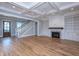 Spacious living room with hardwood floors, fireplace, built-in shelving and high ceilings at 3869 Delinger Dr, Mount Pleasant, SC 29466