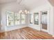 Sunroom features hardwood floors, multiple windows, and a door leading to the outdoors at 3869 Delinger Dr, Mount Pleasant, SC 29466