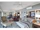 Sunroom with seating area, access to dining area, and water views at 3531 Old Ferry Rd, Johns Island, SC 29455
