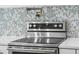 Stainless steel gas cooktop with modern controls and a stylish backsplash at 112 Huckleberry Ln, Summerville, SC 29485