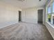 Large bedroom with window and neutral wall colors at 304 Mossy Wood Rd, Summerville, SC 29486