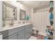 Clean bathroom with double sinks and a shower/tub combo at 207 Shortmarsh St, Summerville, SC 29486