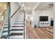 Inviting entryway with staircase and hardwood floors at 207 Shortmarsh St, Summerville, SC 29486