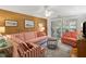 Living room with red and white striped sofa and coastal decor at 1101 Summerwind Ln, Seabrook Island, SC 29455