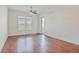 Bedroom with hardwood floors, a ceiling fan and private balcony at 135 Pier View St # 307, Charleston, SC 29492