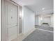 Clean and well-lit hallway with carpeted floors at 135 Pier View St # 307, Charleston, SC 29492