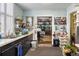 Kitchen with double sink, storage, and view into another room at 240 Calhoun St, Charleston, SC 29401