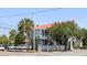 Two-story building with a gray exterior and red roof at 240 Calhoun St, Charleston, SC 29401