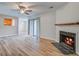 Spacious living room with fireplace and sliding glass door at 607 Waterwood Dr, Goose Creek, SC 29445