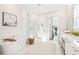 Luxurious bathroom with soaking tub, walk-in shower, and access to home gym at 3559 Clambank Dr, Mount Pleasant, SC 29466